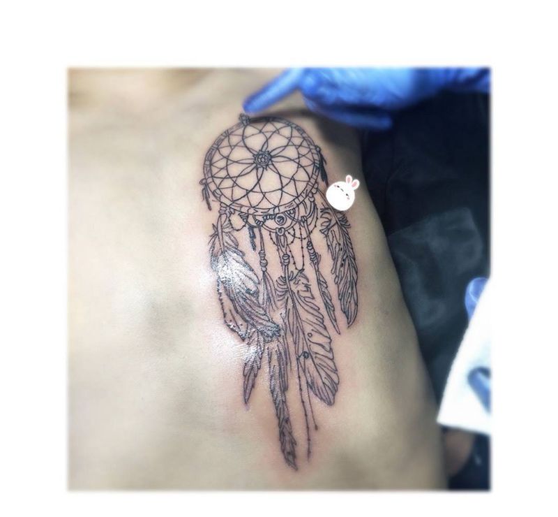 捕梦网纹身图片