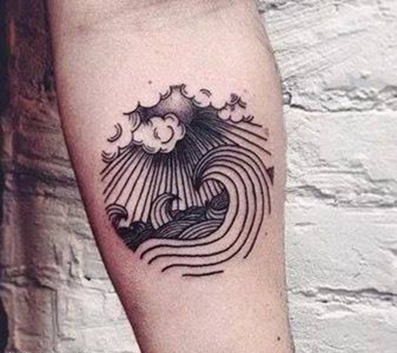 太阳下的浪花纹身图片