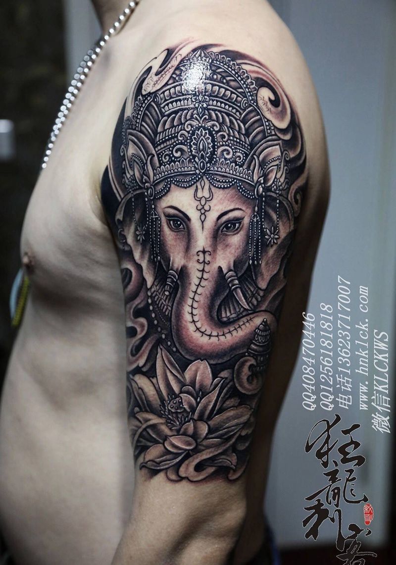 象神纹身图片_成品手臂肩部传统写实肖像图腾动物鬼神植物纹身图案