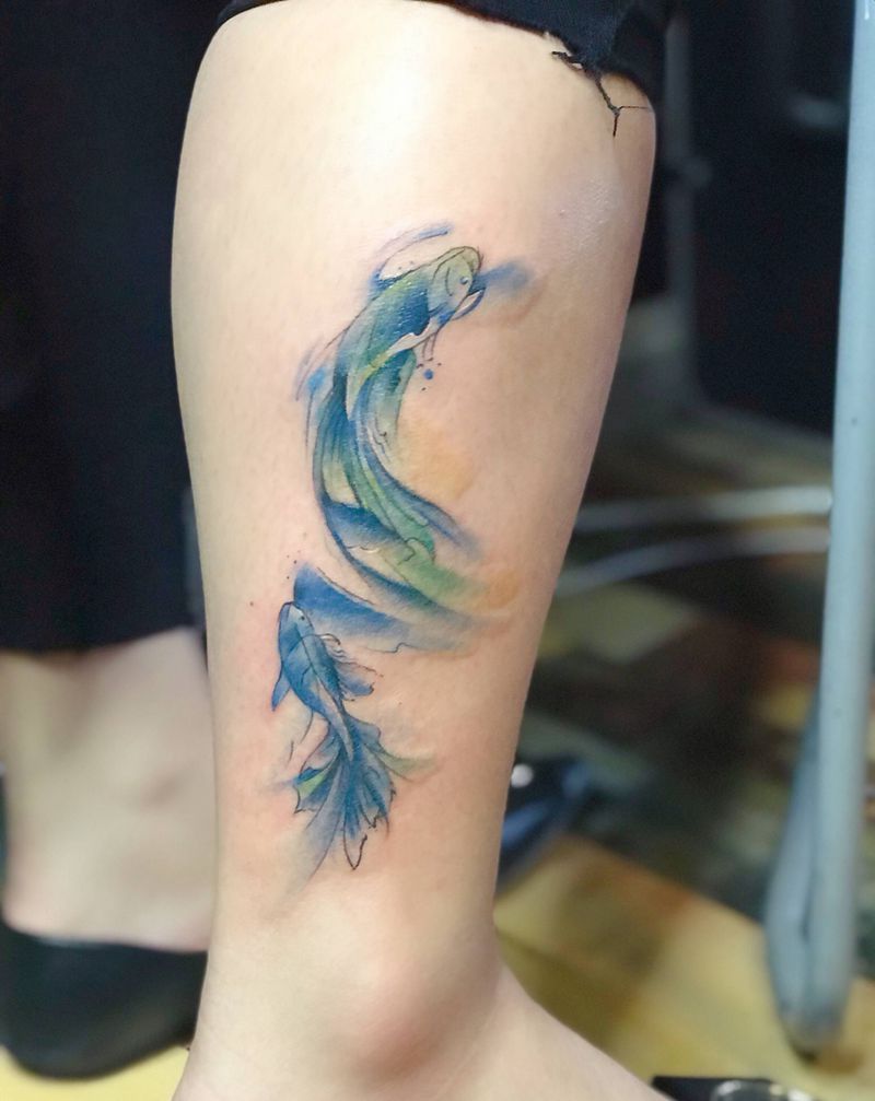 双鱼纹身图片_腿部水彩纹身图案