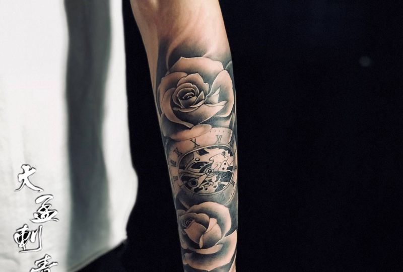 玫瑰纹身图片_手臂欧美写实纹身图案