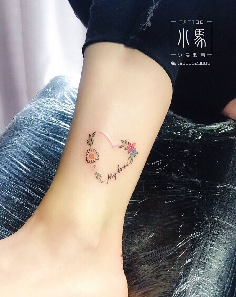 爱心花环纹身图片_腿部纹身图案