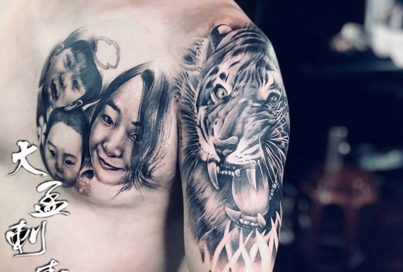 大臂老虎纹身图片_手臂纹身图案