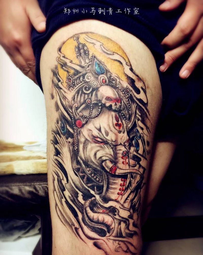 象神纹身图片_成品腿部鬼神纹身图案