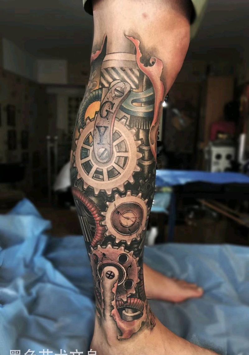 机械腿纹身图片_腿部脚部欧美写实新传统纹身图案