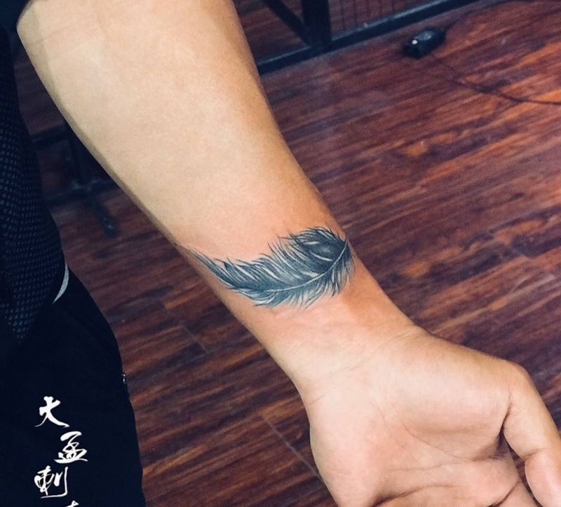 羽毛遮盖纹身图片_成品纹身图案
