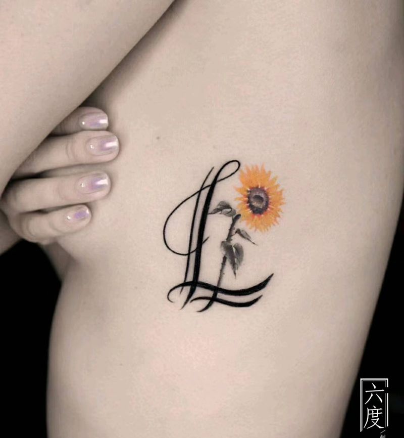 向日葵纹身图片_胸部小清新纹身图案