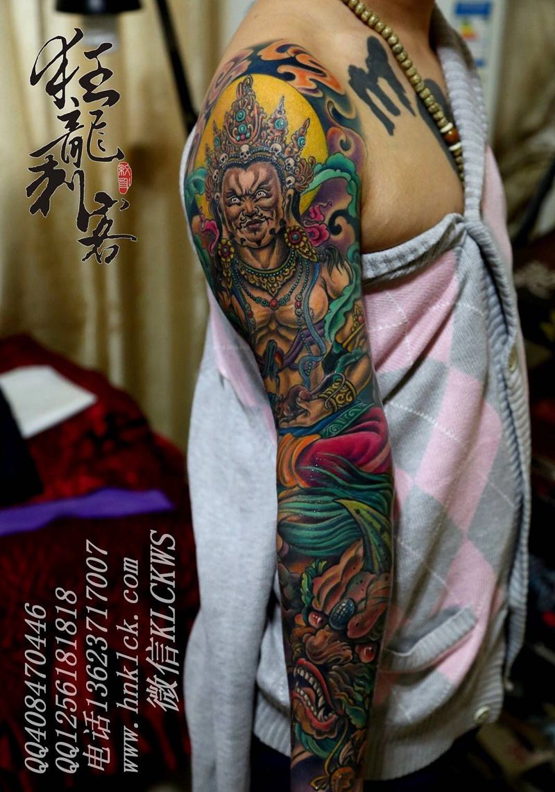 黄财神花臂纹身图片