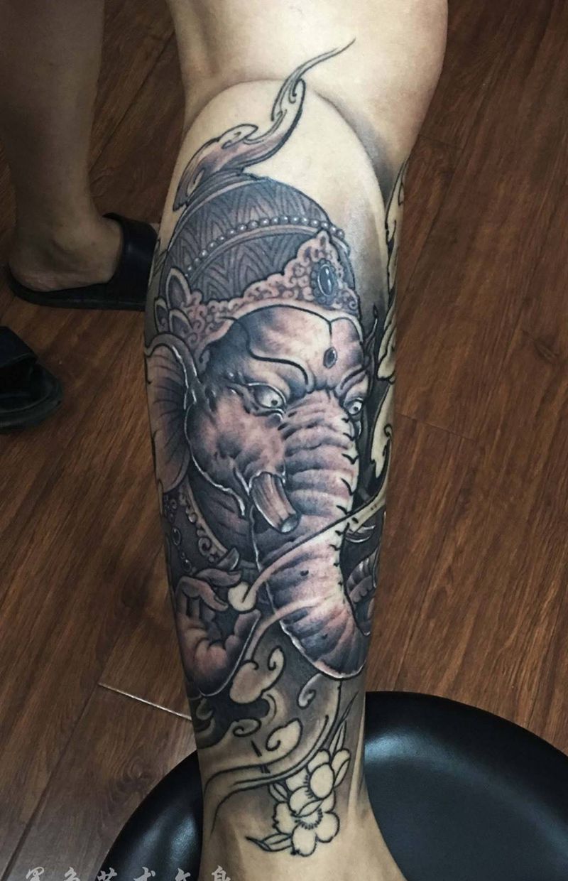 象财神鲤鱼包小腿纹身图片