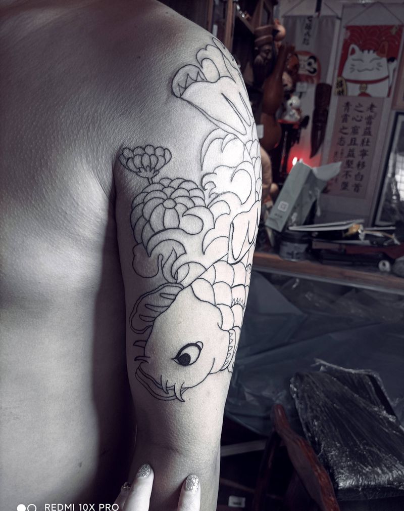 鱼纹身图片_手臂纹身图案