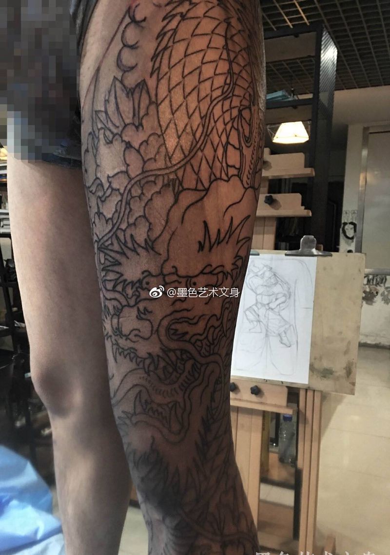 花腿龙牡丹纹身图片