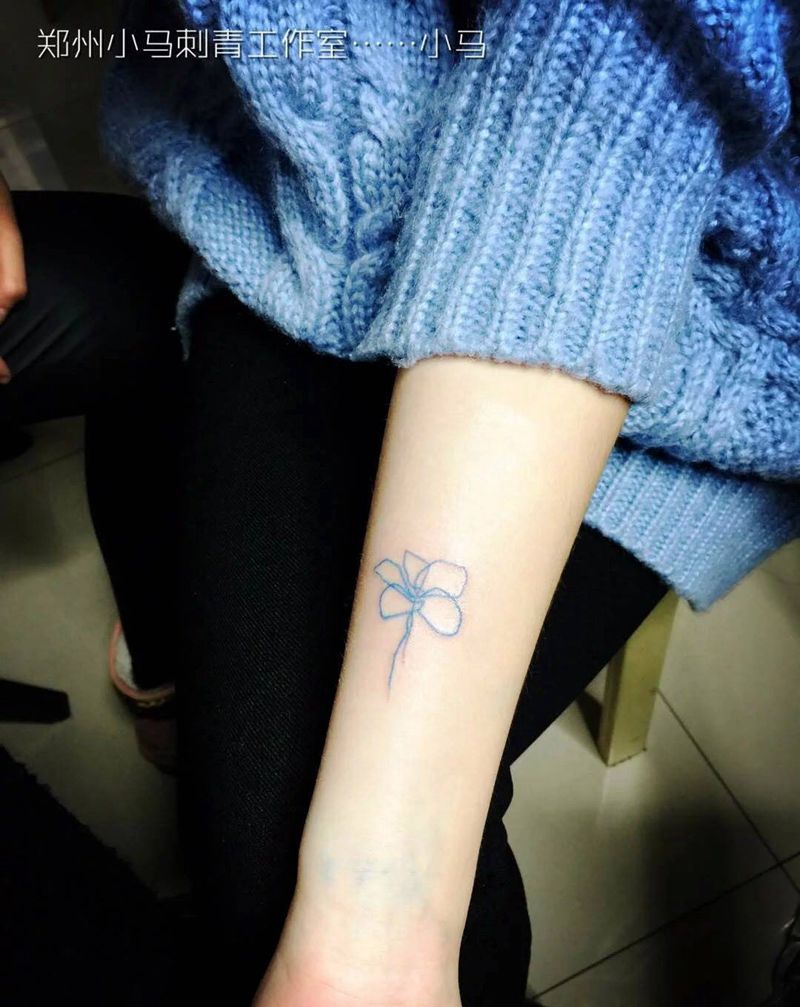 毛线小花纹身图片