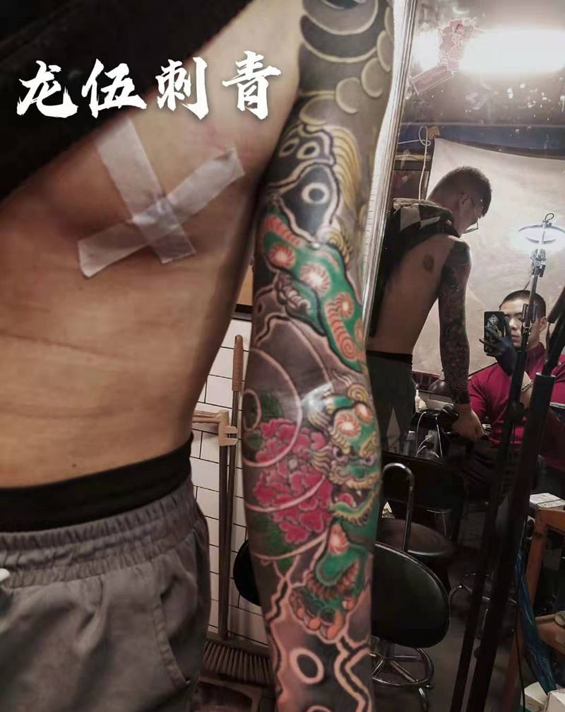 唐狮子纹身图片_手臂老传统唐狮子纹身图案