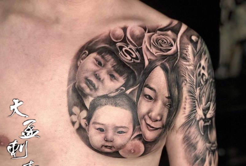 半甲肖像写实作品纹身图片_胸部手臂欧美写实纹身图案