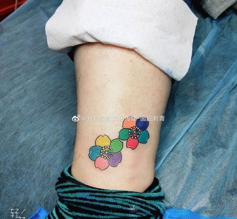 客户原创纹身图片_脚部腿部水彩花樱花纹身图案