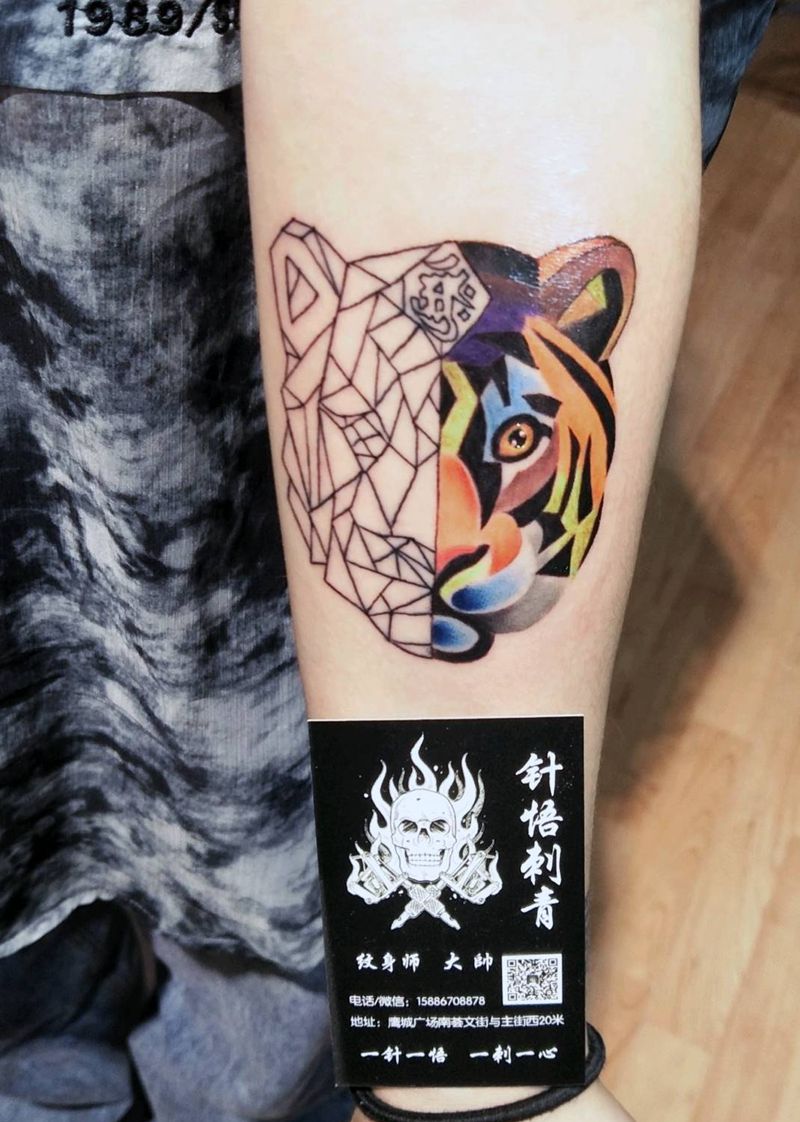 守虎纹身图片_手臂纹身图案