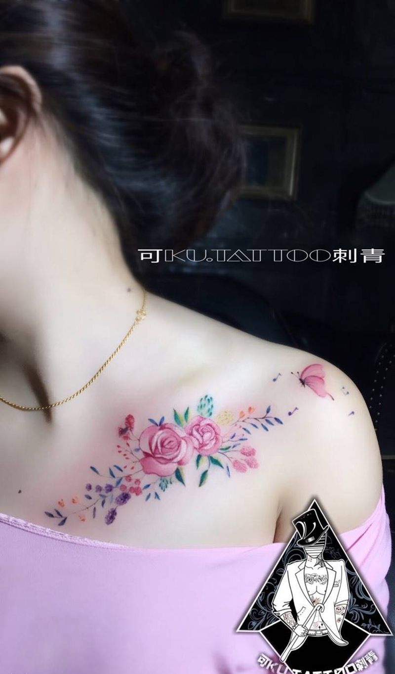 肩头花纹身图片_成品胸部清新植物纹身图案