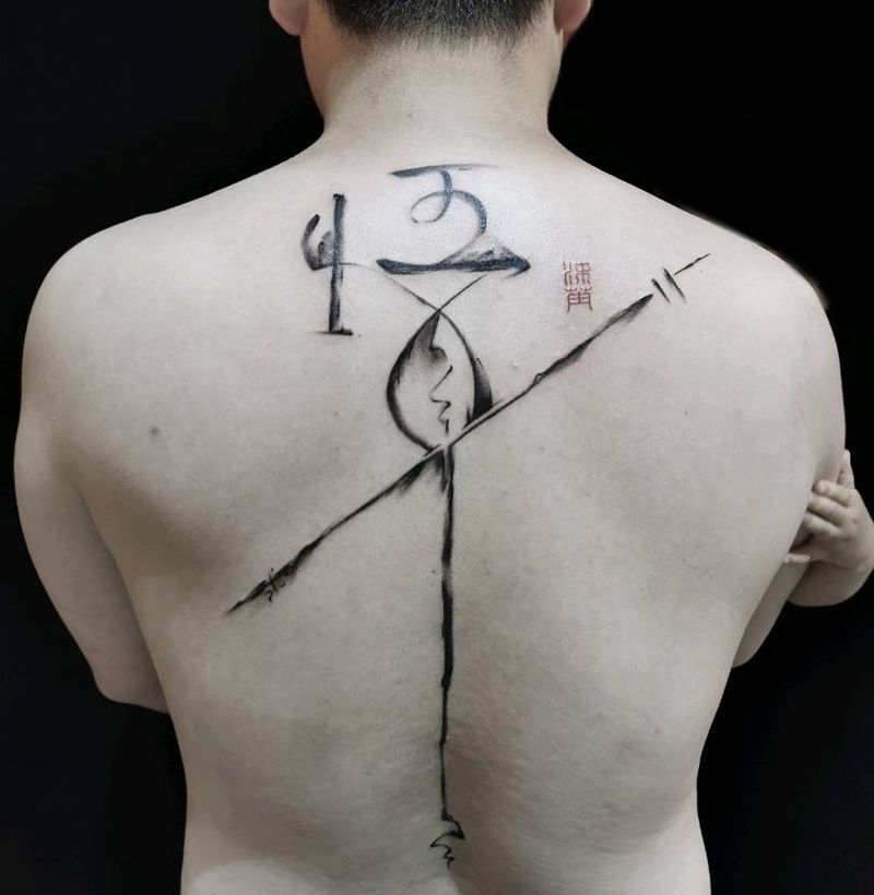 悟纹身图片_背部水墨纹身图案