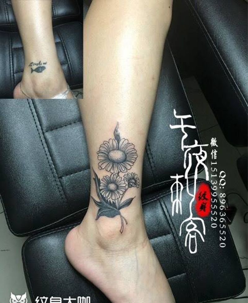 小雏菊遮盖纹身图片_成品腿部静物植物纹身图案