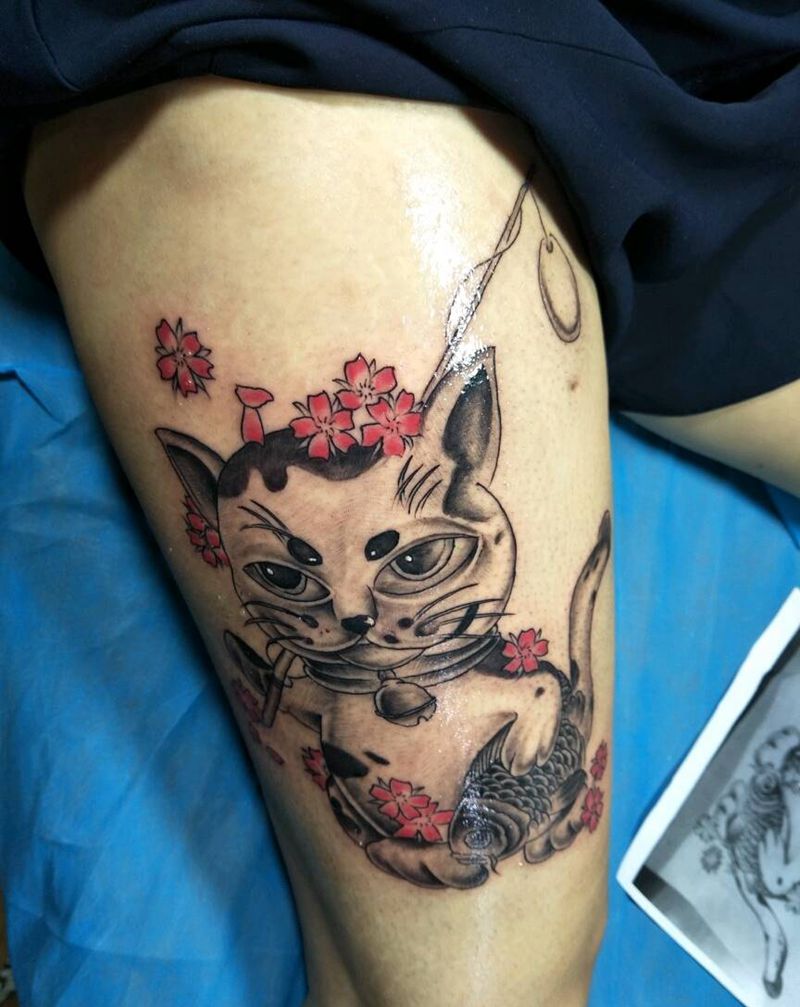 小猫钓鱼纹身图片_腿部传统动物成品纹身图案