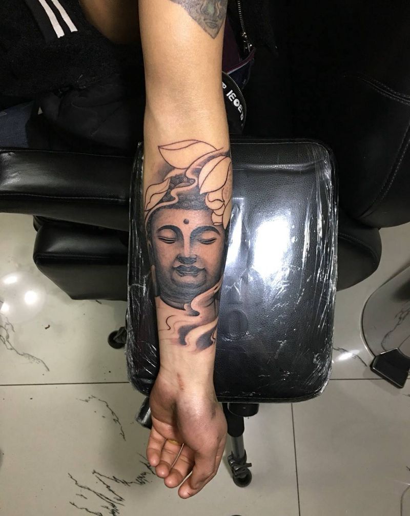 小臂佛头纹身图片