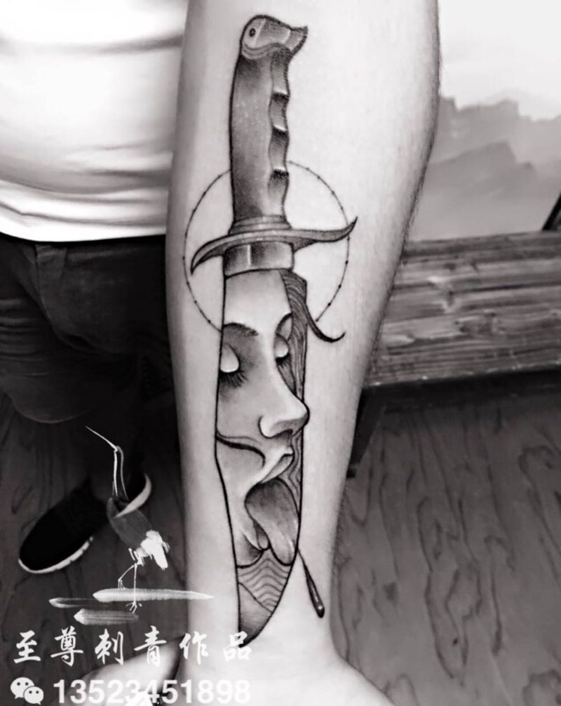 刀口舔血纹身图片