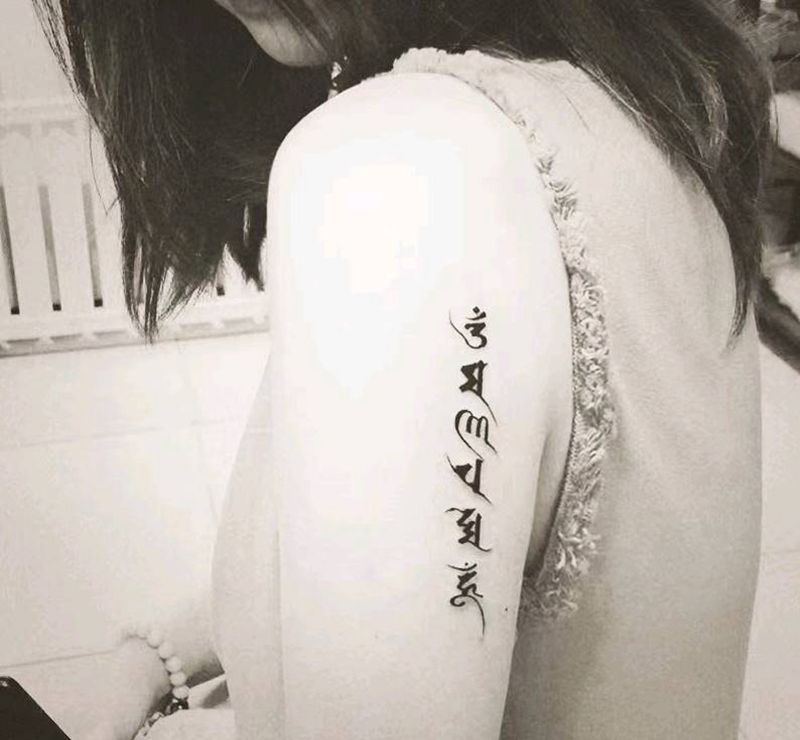 添加纹身图片_手臂水墨纹身图案