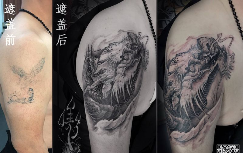 大臂龙头遮盖纹身图片_手臂新传统龙纹身图案