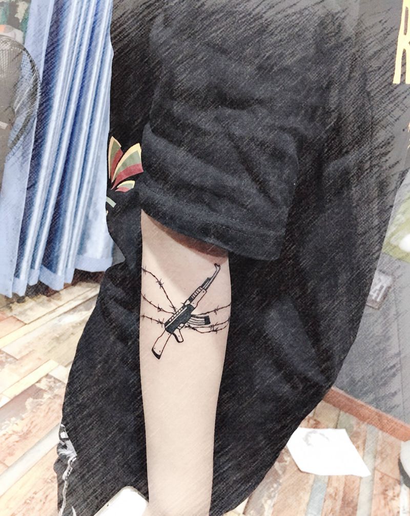 枪纹身图片