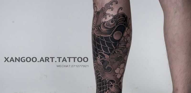 传统鲤鱼纹身图片_成品腿部传统动物原创摄影纹身图案