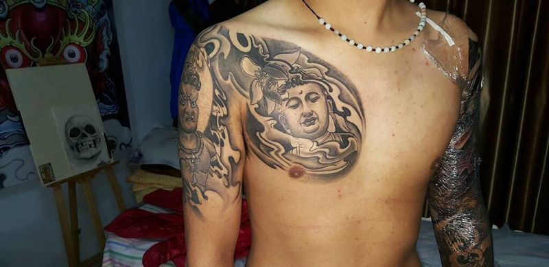 半甲纹身图片_胸部手臂传统人物鬼神宗教半甲成品纹身图案