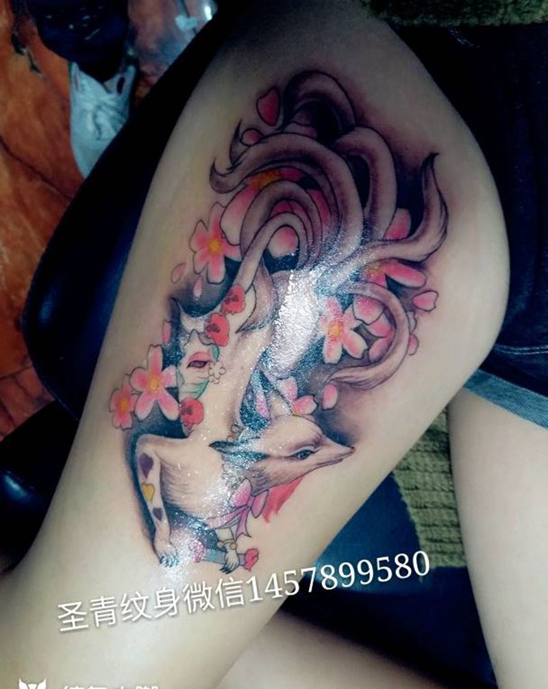 美女大腿九尾狐完成纹身图片