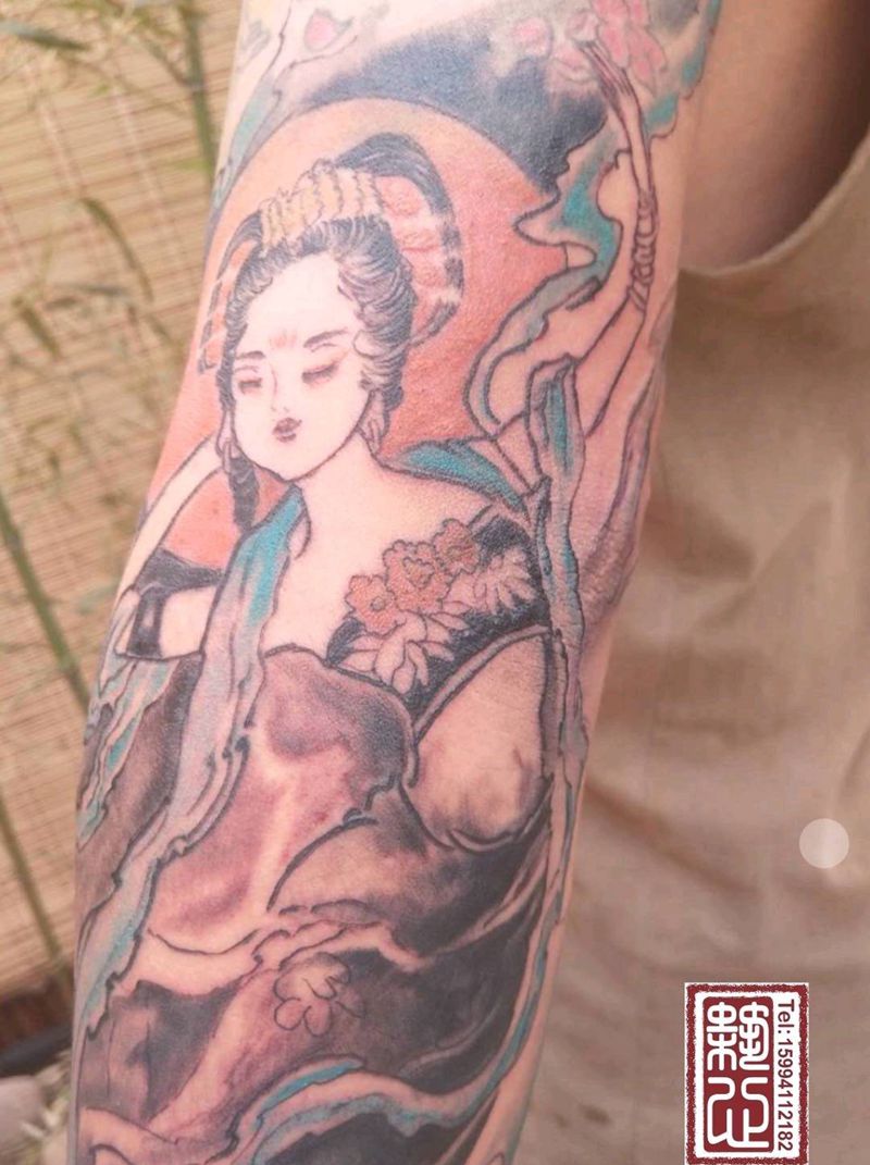 古风花臂纹身图片_手臂水墨水彩纹身图案
