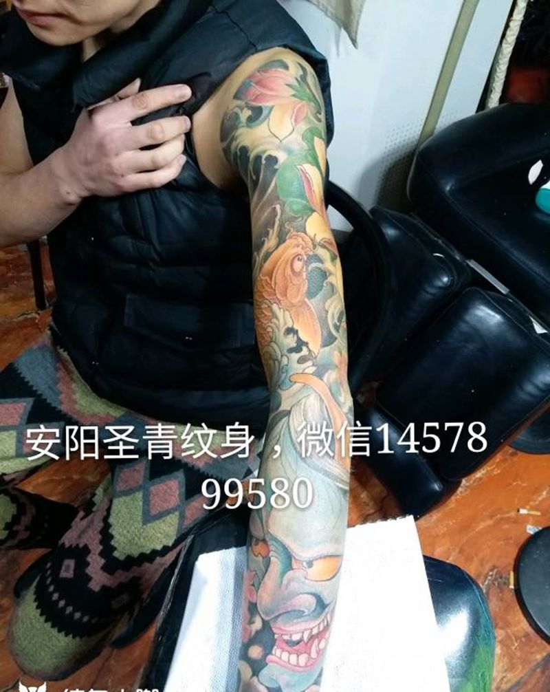 彩色花臂完成纹身图片