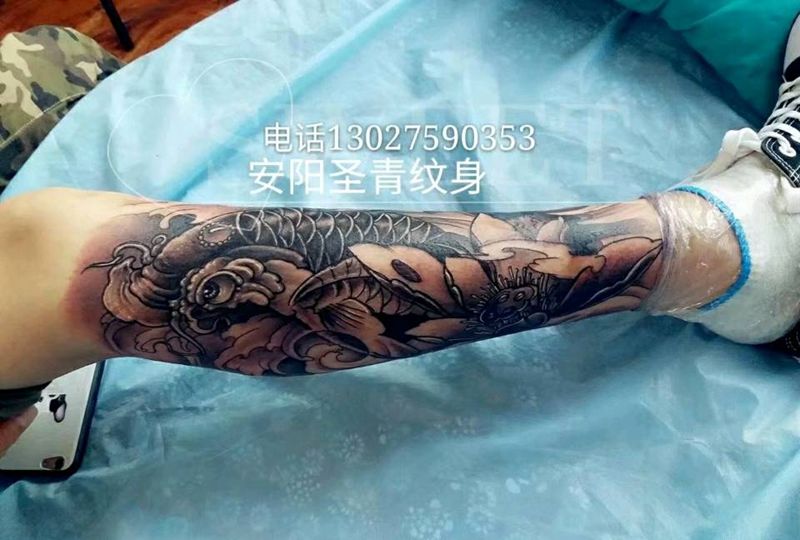 小腿鱼完成纹身图片