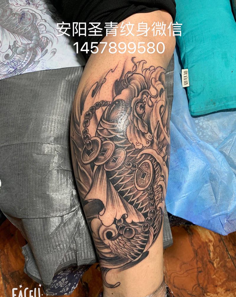 完成漂亮纹身图片_腿部纹身图案