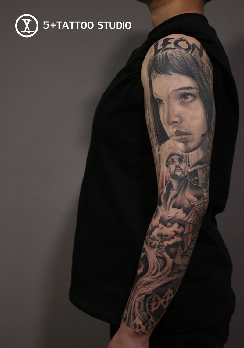 花臂一条纹身图片_手臂欧美写实纹身图案