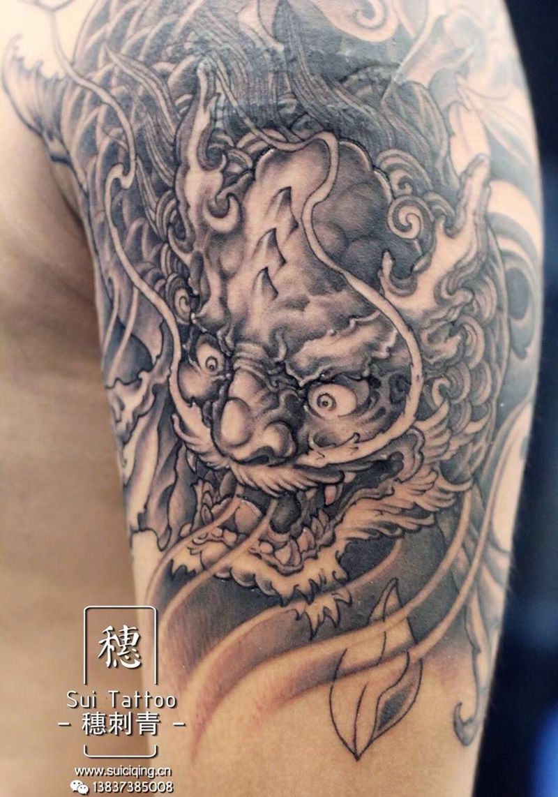 大臂貔貅遮盖纹身图片