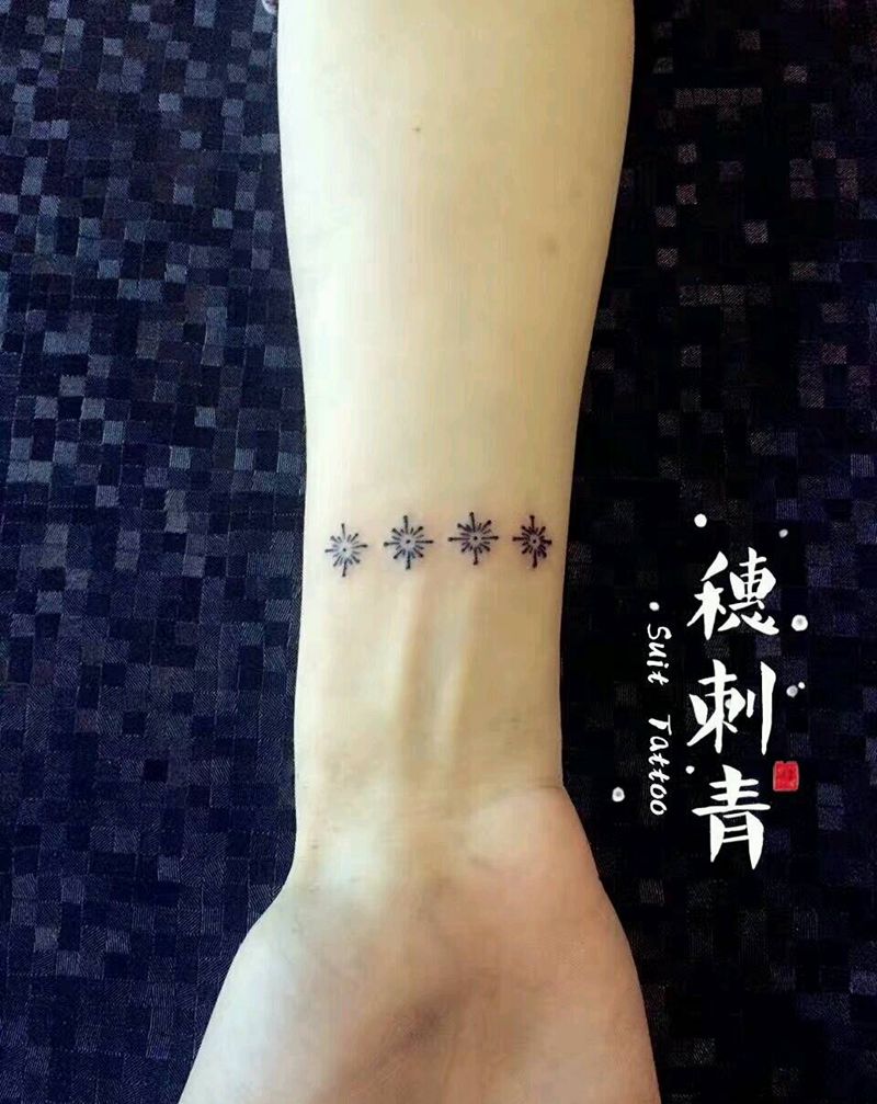 小雪花纹身图片