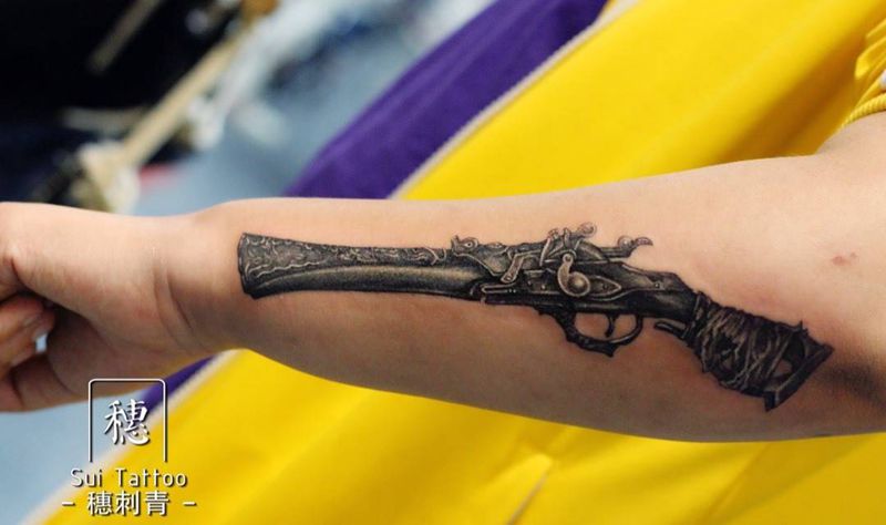 枪纹身图片