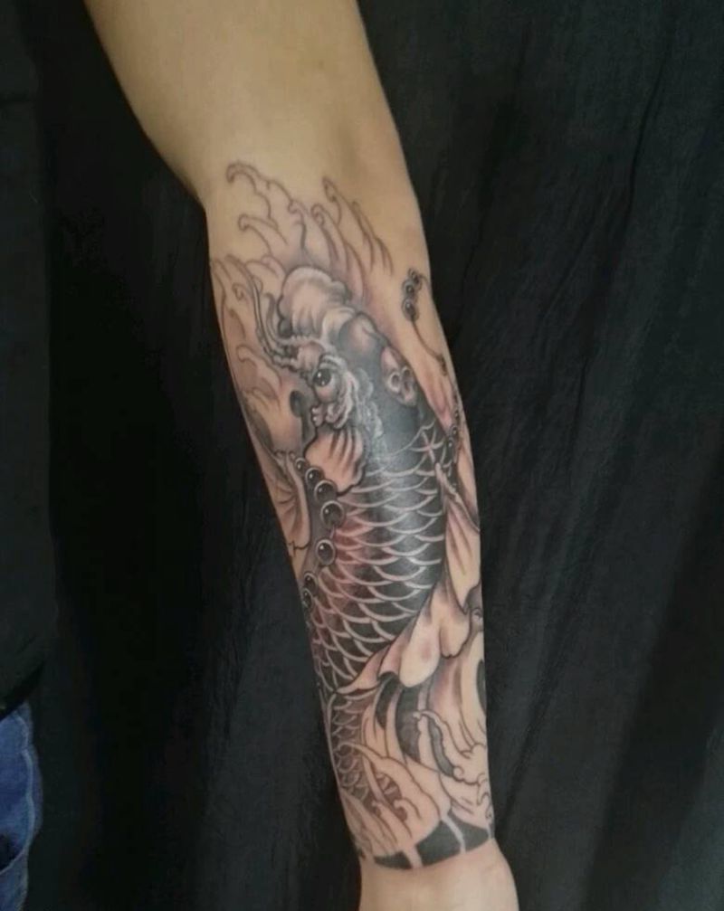 小臂鱼纹身图片