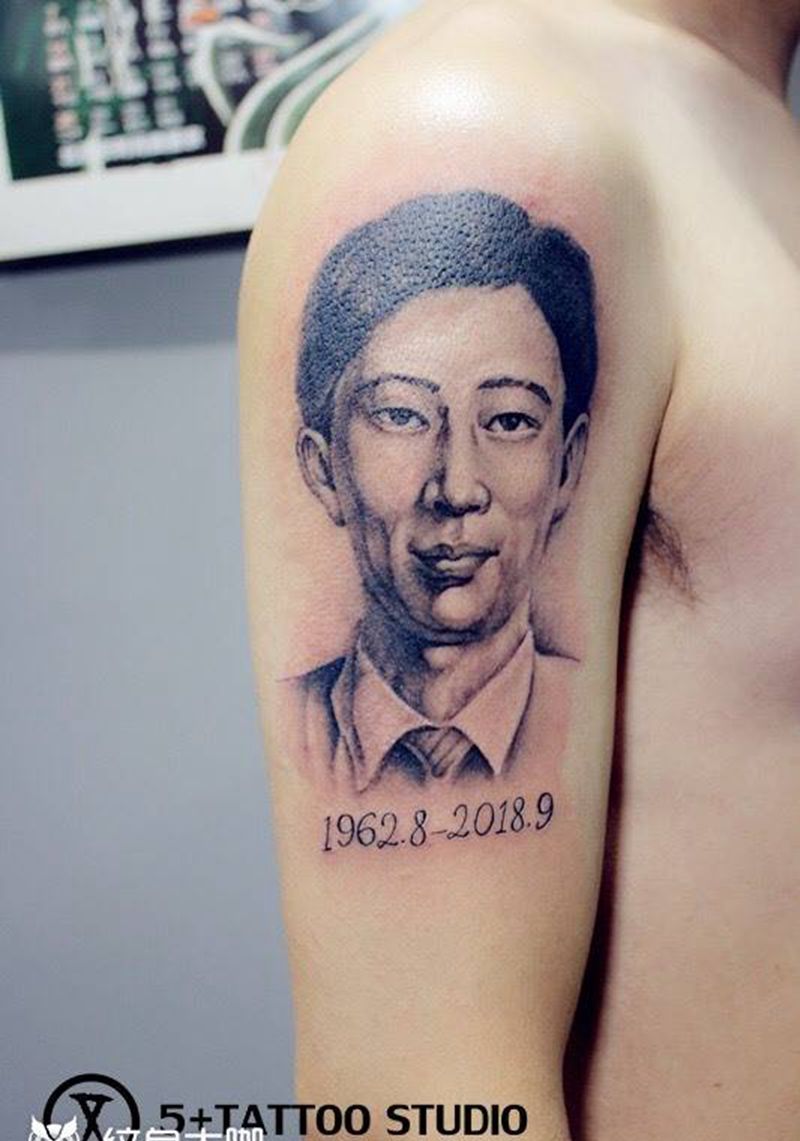 父亲肖像纹身图片