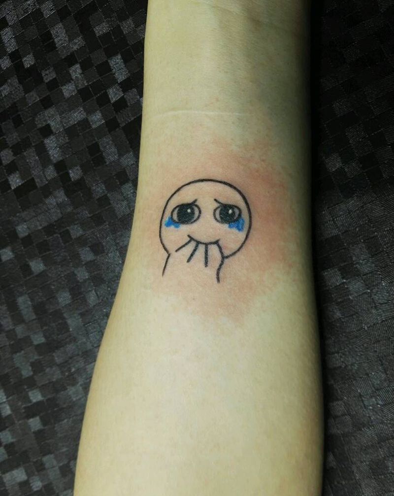 委屈小表情纹身图片