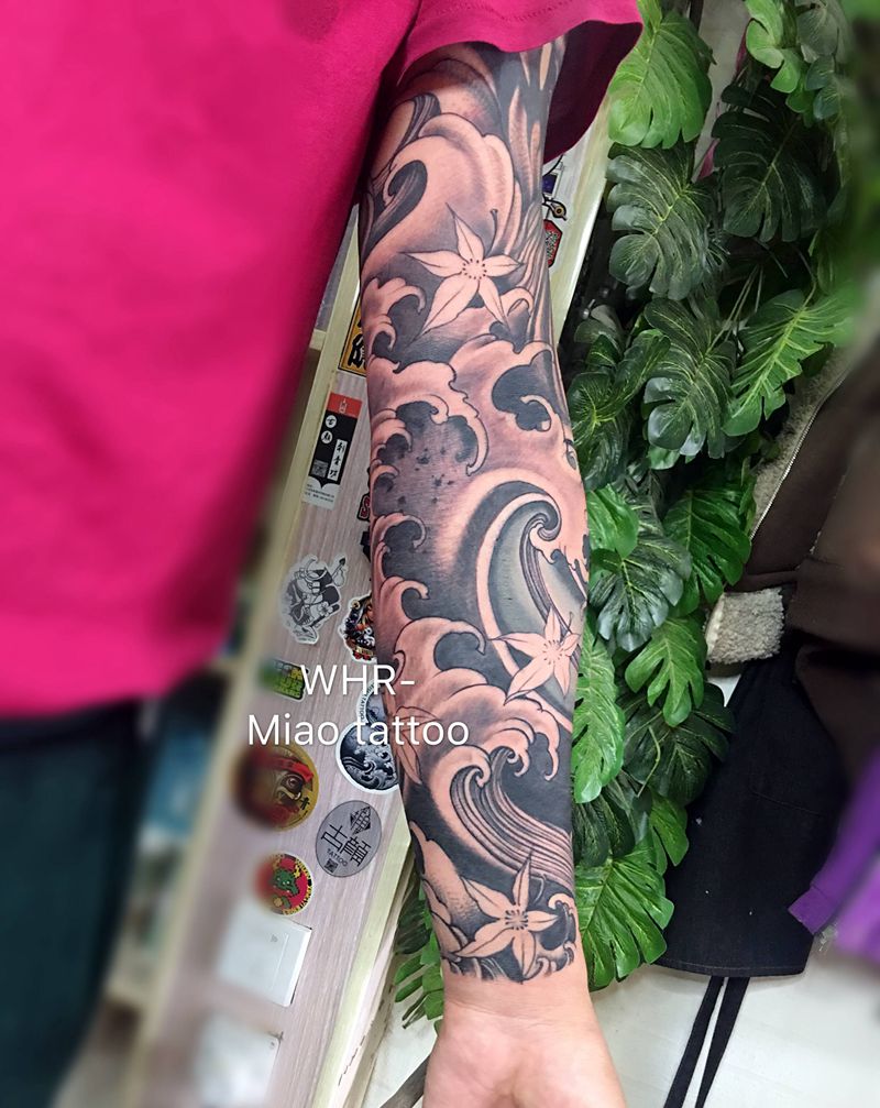 添加花臂待续纹身图片_手臂新传统纹身图案