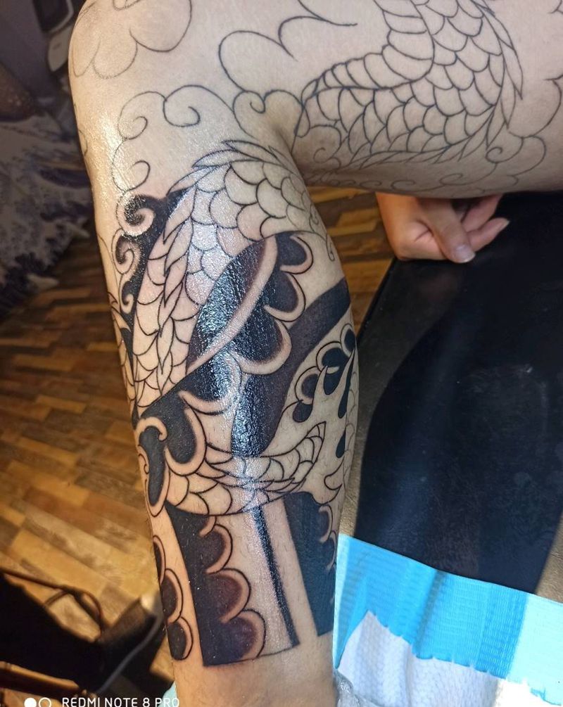 修改龙腿纹身图片_腿部老传统龙纹身图案