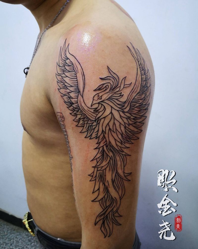 凤凰纹身图片_手臂点刺凤凰纹身图案
