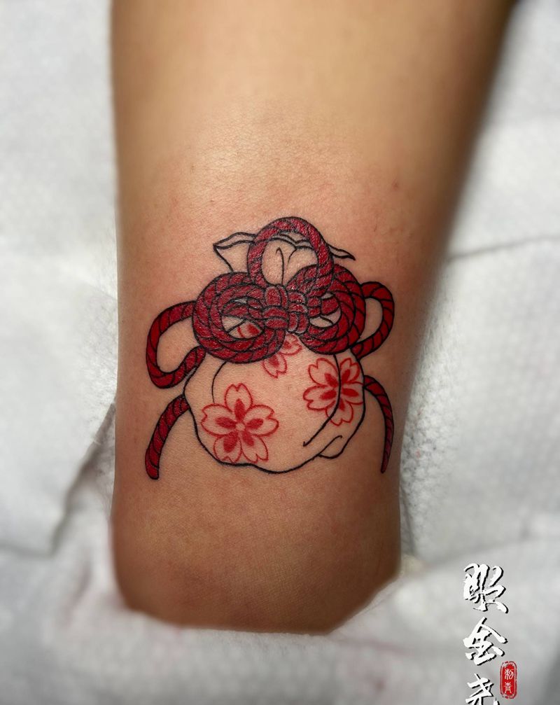 福袋纹身图片_腿部老传统福袋纹身图案