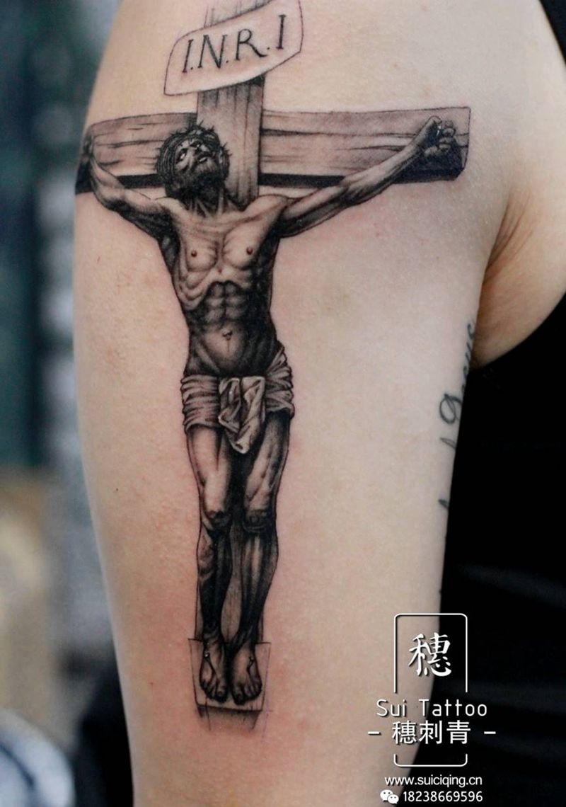 耶稣纹身图片_手臂欧美写实纹身图案