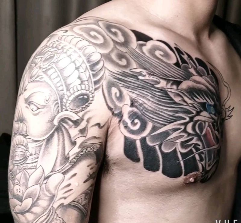 半甲象神龙头纹身图片_胸部手臂新传统纹身图案