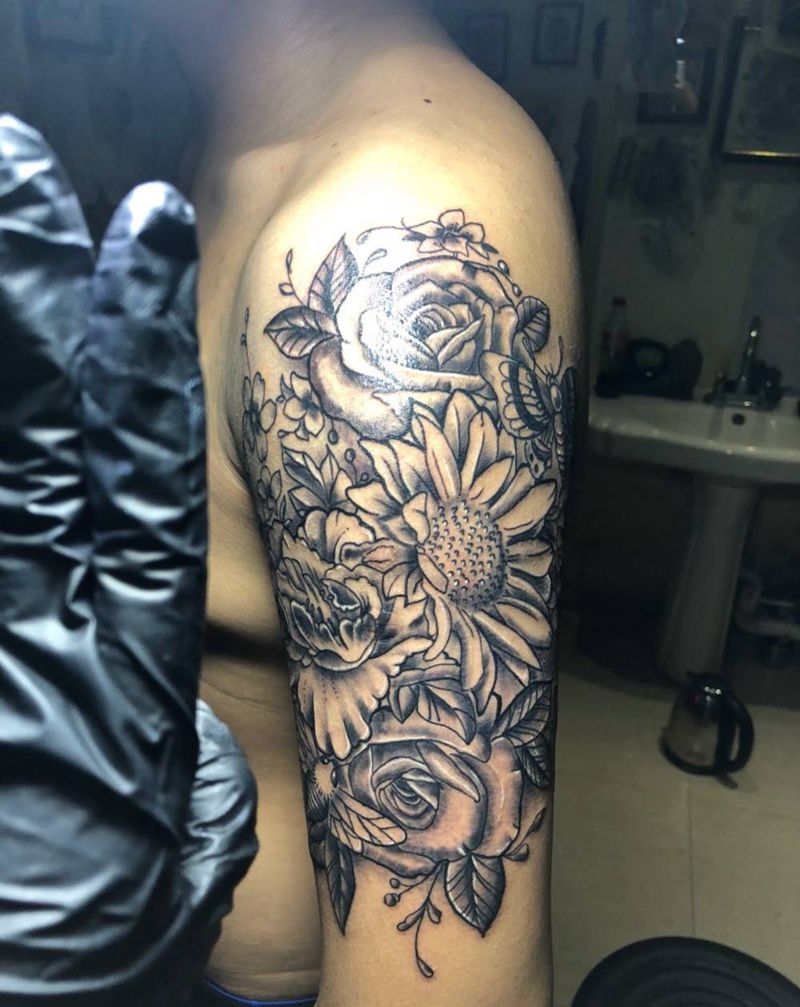 大臂花纹身图片